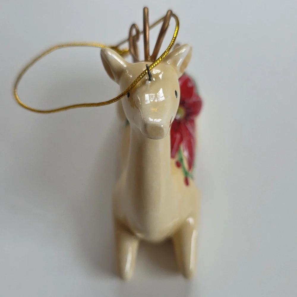 Holiday Reindeer Ornament with Red Flower Accents